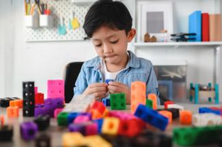 child playing with blocks