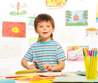 child cutting paper